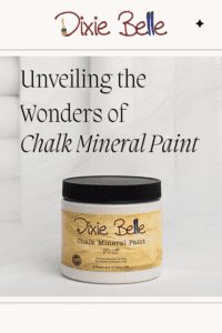 A sealed jar of Fluff sitting on a white table with white towels in the background, the words Unveiling the Wonders of Chalk Mineral Paint are printed above the paint