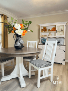 a photo o a dining table and chairs painted with Salt Water Silk All-In-One Mineral Paint and a hutch painted with Salt Water Silk All-In-One Mineral Paint+