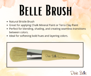 Belle Brush on a light peach and yellow background with information about the brush printed above the brush.