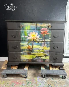 Lily Pads decoupage paper applied to the front of a black painted dresser