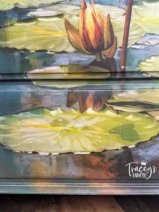 Close up of blended paint with Lily Pads decoupage paper on dresser drawers