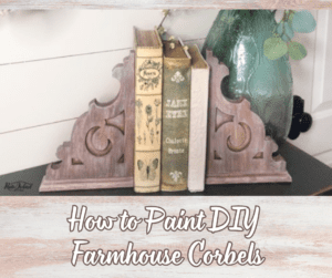 A pair of wooden bookends painted with Voodoo Gel Stain holding up 3 books 